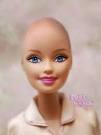 With A Bald Barbie Doll!