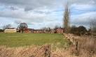 Sicily Oak farmhouse (right) has two sets of farm buildings adjacent. - via Daymix