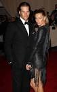 While Tom and Gisele are,