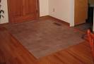 Tiles on wooden floor dining room