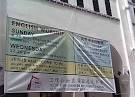 File:Banner announcing English and Hokkien services, Telok Ayer