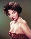 She was not yet done, marrying Percy Gibson (32 years younger) in 2002. - Joan-Collins