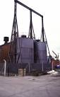 The building behind contained the water hydraulic power pumps. - via Daymix