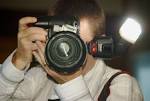Photographer caught in action - via Daymix