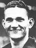 career (as a centre-half) included spells at Portsmouth and Southampton,