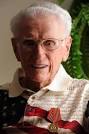 richard lowe veteran.jpg WWII veteran Richard Lowe wears the medal he ... - 9697914-large