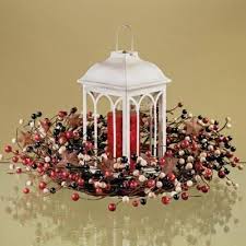 Moroccan Lanterns...what next? :  wedding centerpieces lanterns white Images?q=tbn:ANd9GcRbsk5YTg5fqfG7IP9ZlDUCnmA2sCvwwKoEVtr77Vj6yDuFsL2h