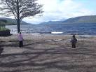 look hopefully down the length of Loch Ness for a glimpse of Nessie. - via Daymix