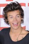 HARRY STYLES demonstrates French skills while relaxing on the.