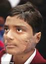 Om Prakash Yadav pulled children out of a burning van - article-2088602-0F84CAED00000578-444_306x423