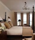 Soft Brown Wall Colors with Elegant Curtains in Small Apartment ...