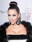 http://cdn.glamcheck.com/fashion/files/2011/10/Kim-Kardashian-Sleek-Top-Knot-hairstyle.jpg