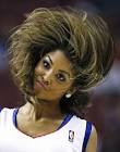Whips Her Hair Back And Forth
