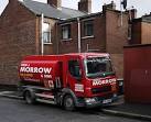 Small tanker delivering heating oil off Great Northern Street in Belfast. - via Daymix