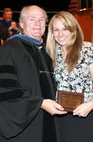 Valdosta\u0026#39;s Nikki Lunceford (R) is presented with the Outstanding Student in Leadership and Community Service Award by Dr. Thomas J. Glennon, ... - Lunceford