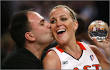 ... gets a kiss from husband Vasilis Giapalakis after last year's contest. - douglasx