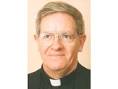 Father Joseph Kelleher faces