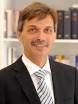 Dr. Jörg Becker, Professor