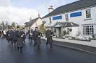 NH9022 : Strathspey Pipe band pass the Cairn hotel Carrbridge - via Daymix