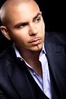 In "Shut It Down" music video, Pitbull appears as Armando Bond who is ... - images?q=tbn:ANd9GcRpBCMyekAfkR89dgSOVIRqzmvrE85V2HLAZ-WgJnsVvRk-TrhcgnNa_C76