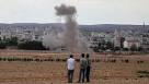 Turkey vows to fight Islamic State, coalition strikes near border