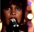 Whitney Houston, singing "I