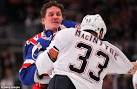 Derek Boogaard death: Family of NHL brawler sues NHL over his