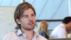 Founder of Seattle company to set new minimum wage, pay workers.