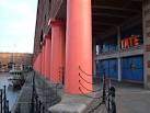 A gridline crosses this corner of the dock; most of the facade of the Tate - via Daymix