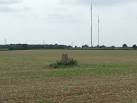 Trig point with the Sudbury television transmitter mast in the distance near - via Daymix
