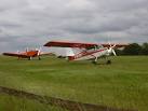 Planes on the air strip at the Bristol and Gloucestershire Gliding Club - via Daymix