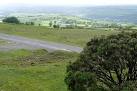 A farm lane runs along the western side of Cox Tor. - via Daymix