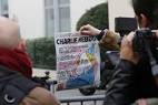 Charlie Hebdo shooting: Police hunt brothers after Paris attack.
