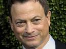Gary Sinise was hurt in a car