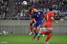 Madhu M Mohana of Singapore and Shinji Okazaki of Japan compete.