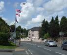 Triple flag flying, Omagh. The same is repeated on each lamp standard along - via Daymix