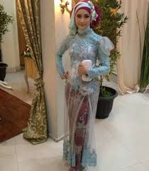 Model Jilbab Untuk Wajah Bulat dengan Gaya Jilbab Silang