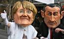 Lifesize puppets of Sarkozy
