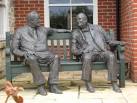 in bronze on a bench near the - via Daymix