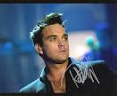 Photo Gallery: <b>Robbie Williams</b> Jokes about