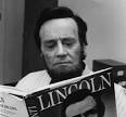 Henry Fonda reads up on one of