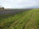 This is the second-longest runway on the airfield, running from SE to NW, - via Daymix