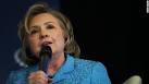 Hillary Clinton walks tightrope on Iran, defends State record.