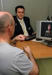 File:A Video Relay Service session helping a Deaf person