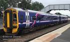 Train Photos - First SCOTRAIL class 158 train at Dalmeny station.