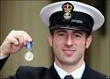 Petty Officer James O'Donnell, based in Cornwall, received the Queen's ... - _44168191_queenodonnel_pa416