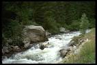 David Benson traversing the river via a tyrollean traverse ...