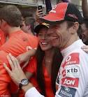 Hungarian Grand Prix 2011: Jenson Button celebrates with Jessica
