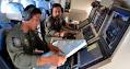 AirAsia QZ8501: Stormy weather hampers search; seven bodies found.