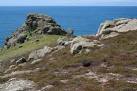 This granite outcrop is called Carn Sperm. This is a twin headland, - via Daymix